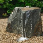 Drilled boulders for fountain