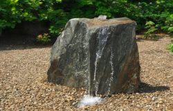 Drilled boulders for fountain